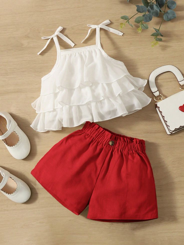 Summer monochrome kids outfit flatlay
