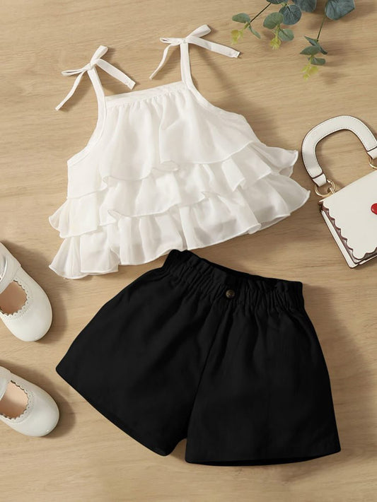 White ruffle top and black shorts set for girls
