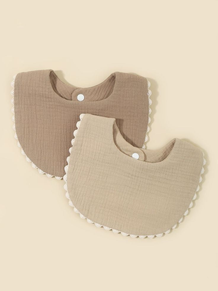 Stylish cotton baby bibs with lace edge detailing

