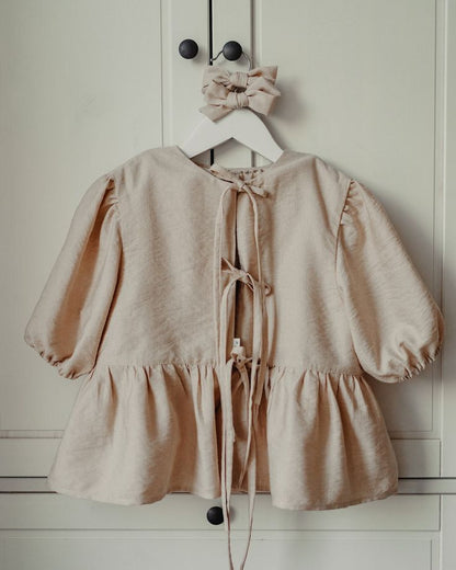 Peplum and shorts baby outfit with flowers

