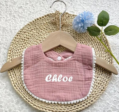 Custom embroidered muslin bibs with names Kiesha, Elena, Camila

