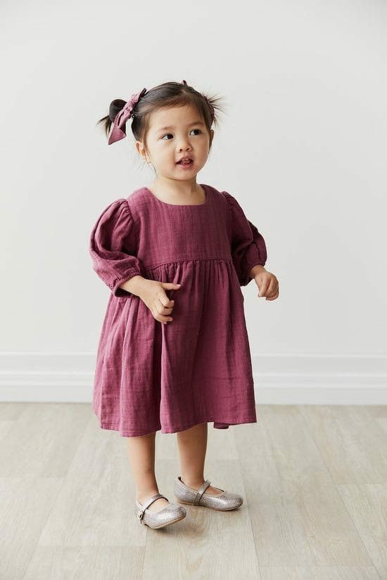 Toddler girl in wine cotton frock

