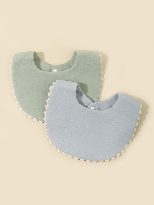 Neutral-toned muslin bibs for your baby princess
