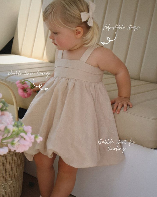Elegant toddler dress with big bow at the back