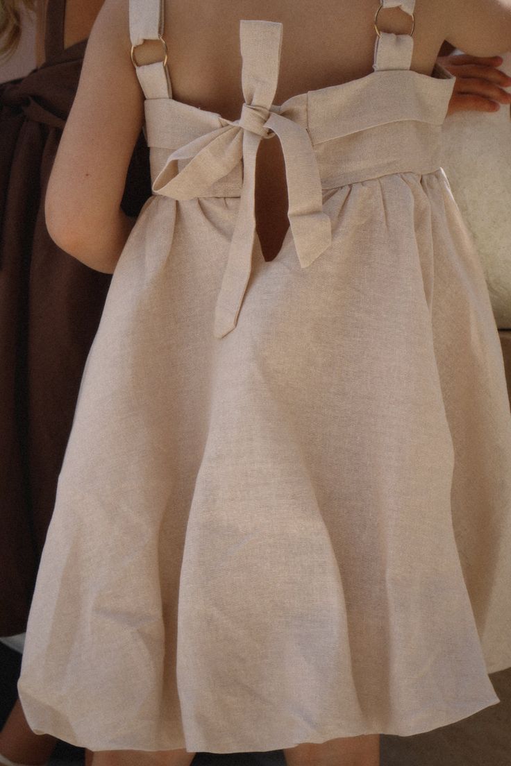 Cute baby girl outfit with ruffle straps and flared skirt