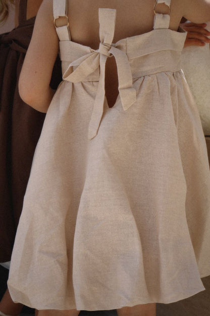Cute baby girl outfit with ruffle straps and flared skirt