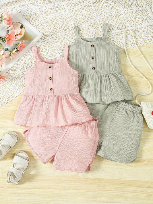 Stylish light pink and grey two-piece summer outfits for toddler girls with sleeveless top and shorts